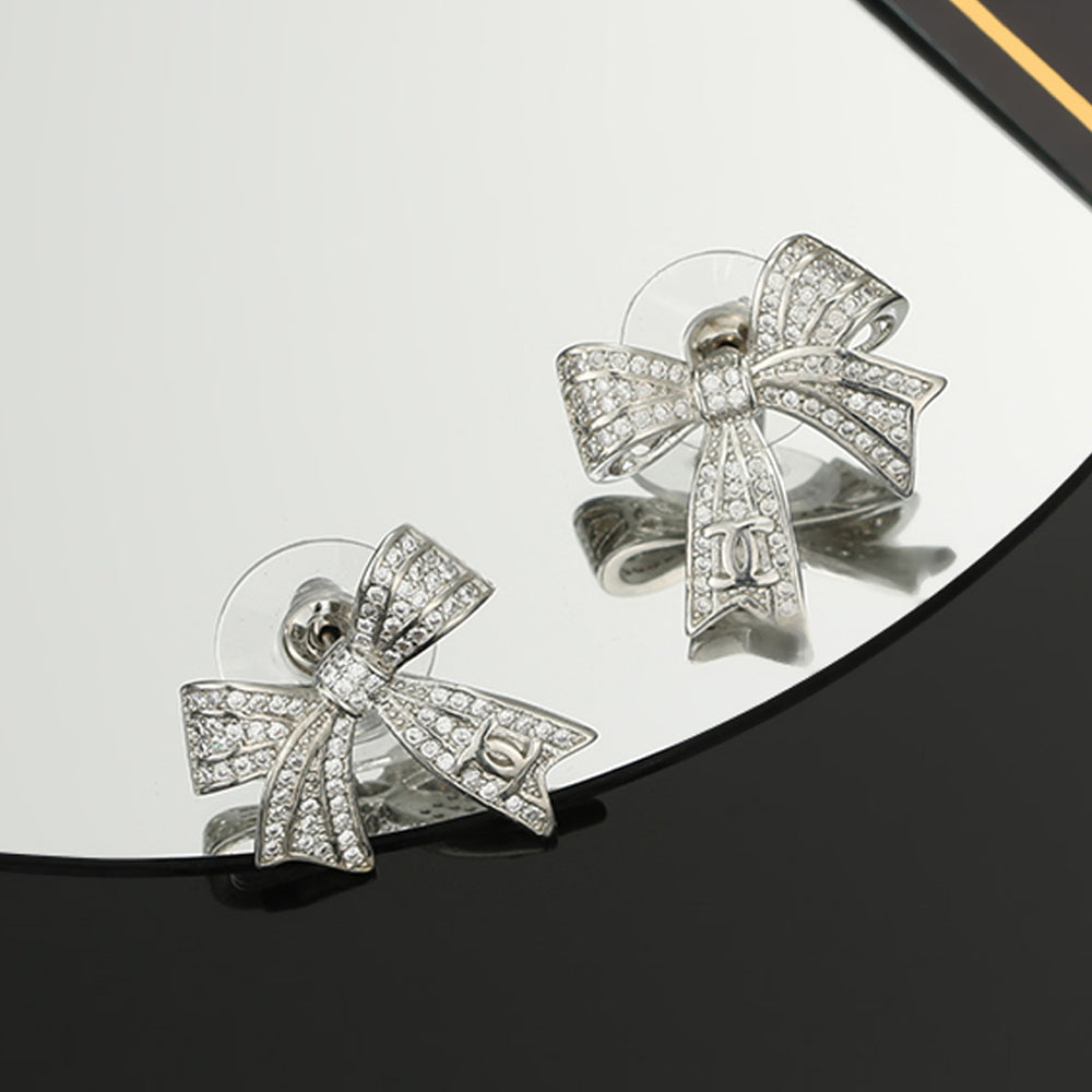 Chanel Bow Tie Diamond Earrings - 18K White Gold