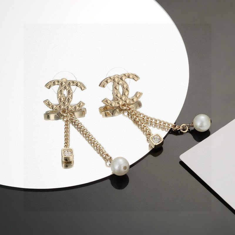 Chanel Long Pearl Pendant Earrings - 18K Yellow Gold