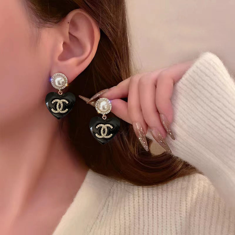 Chanel Black Heart Earrings - 18K Yellow Gold