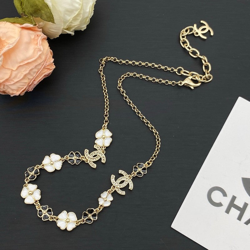 Chanel Black & White Camellia Necklace