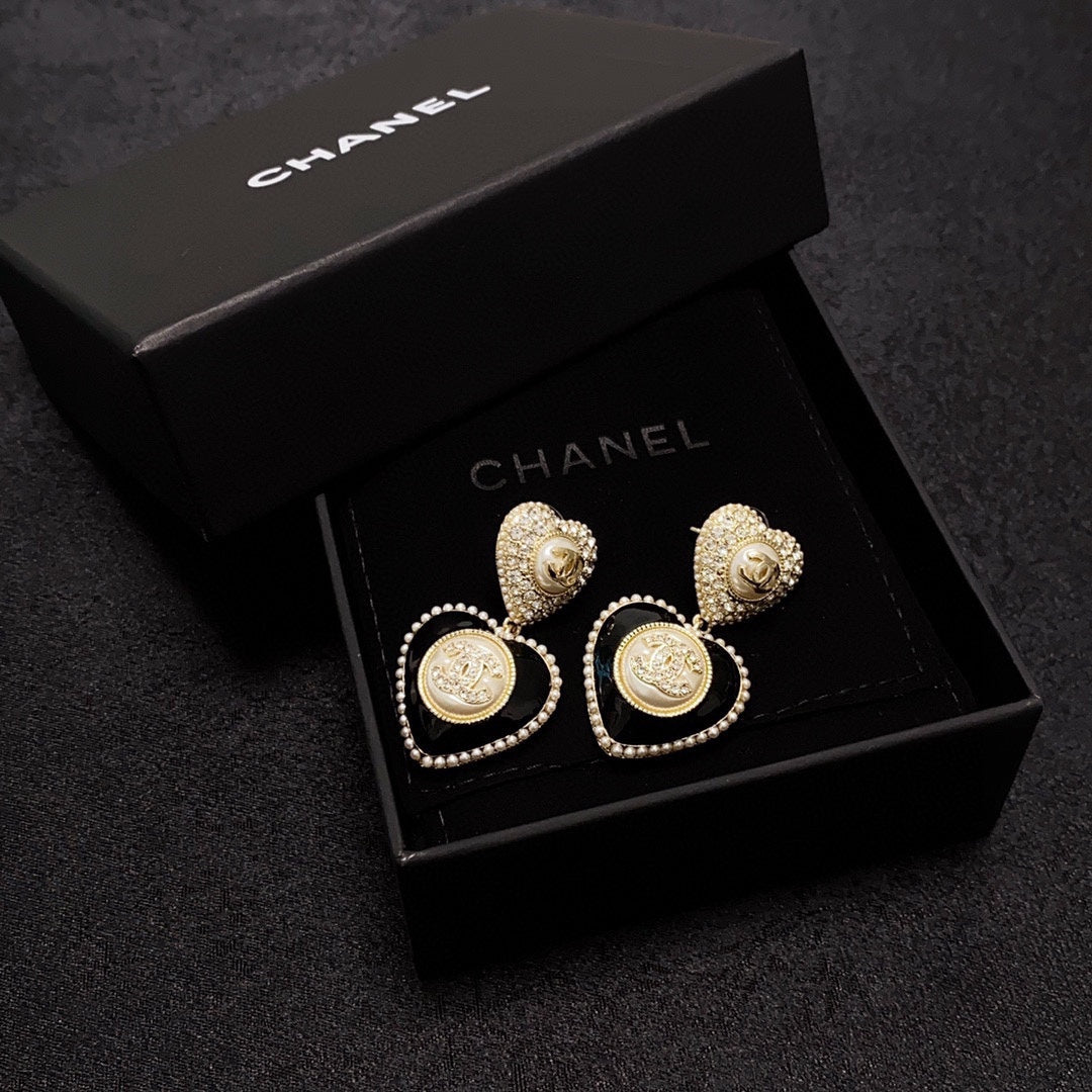 Chanel Black Heart Earrings - 18K Yellow Gold