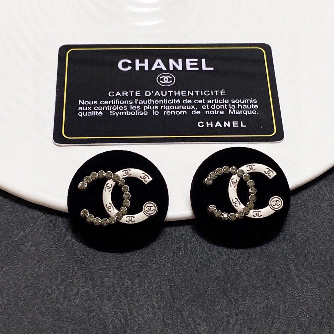 Chanel Black Resin Circle Earrings - 18K Yellow Gold