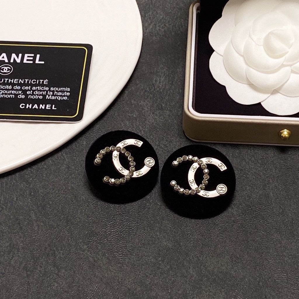 Chanel Black Resin Circle Earrings - 18K Yellow Gold